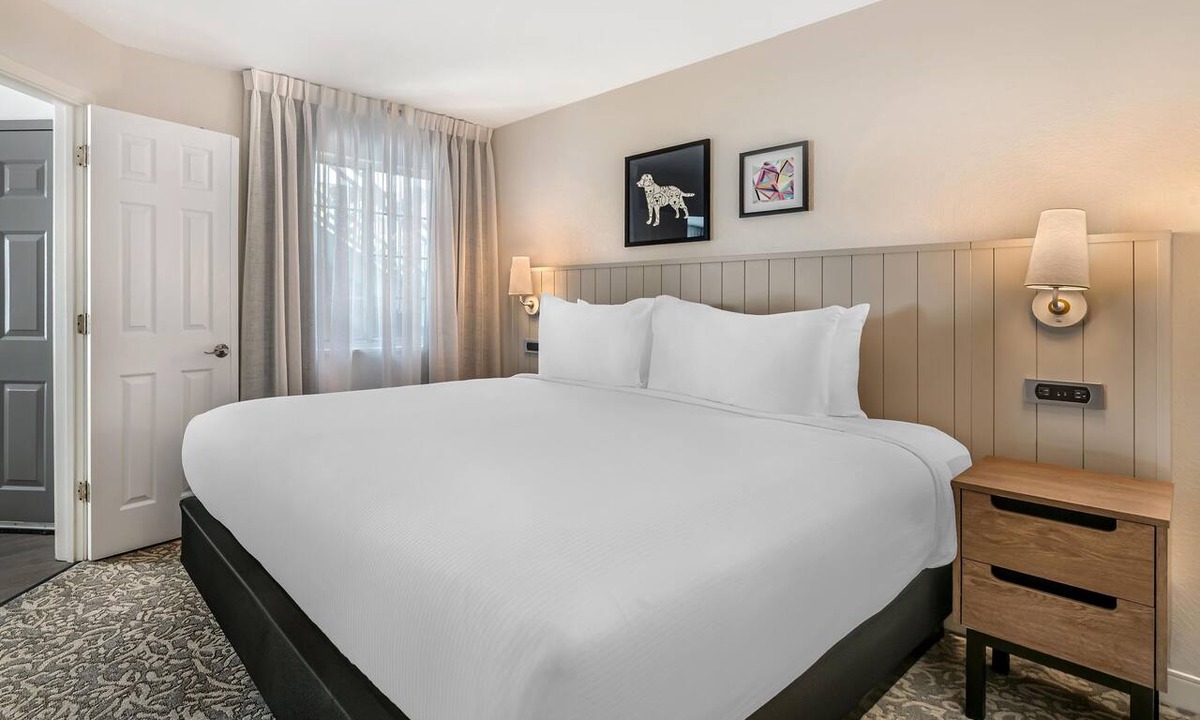 Florida Central Atlantic Coast Hotel | Close to SeaWorld Orlando! TWO 2BR Suites with Kitchens, Pool, Pets Allowed!
