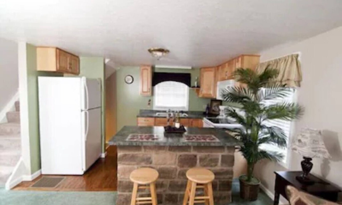 Dundee Cottage | Escape to our romantic stone cottage by a pond overlooking Amish country