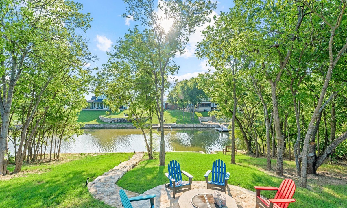 Dennis Cabin | Lakefront! Fire Pit, Kayaks, Foosball, Sparkling Clean Hot Tub