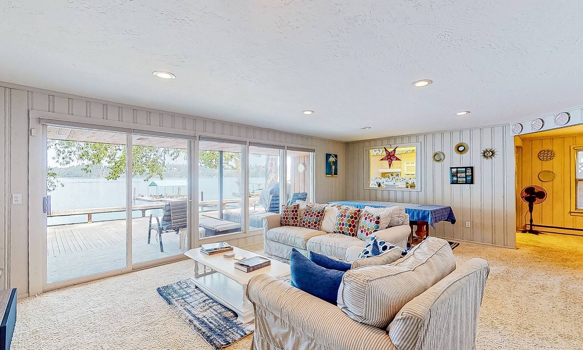 Clarksville House | Lakeside retreat with a dock, firepit, grill, board games, jetted tub, and W/D