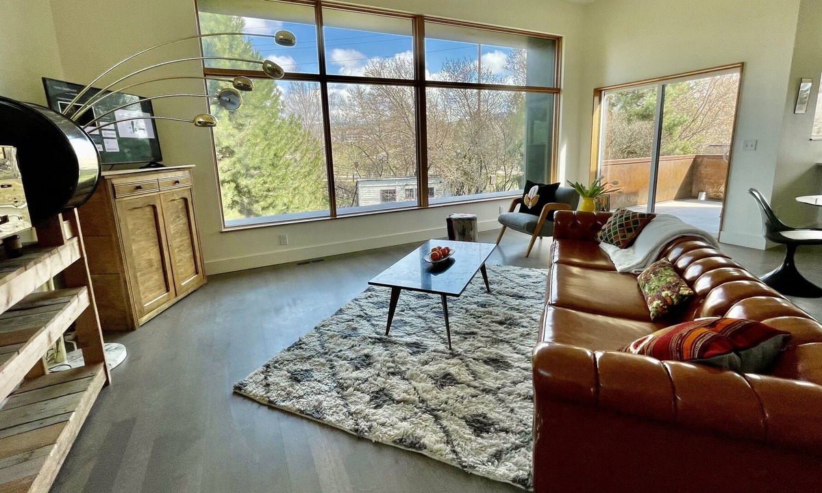 Riverfront Apartment | Modern, bright and spacious apartment with mountain views.