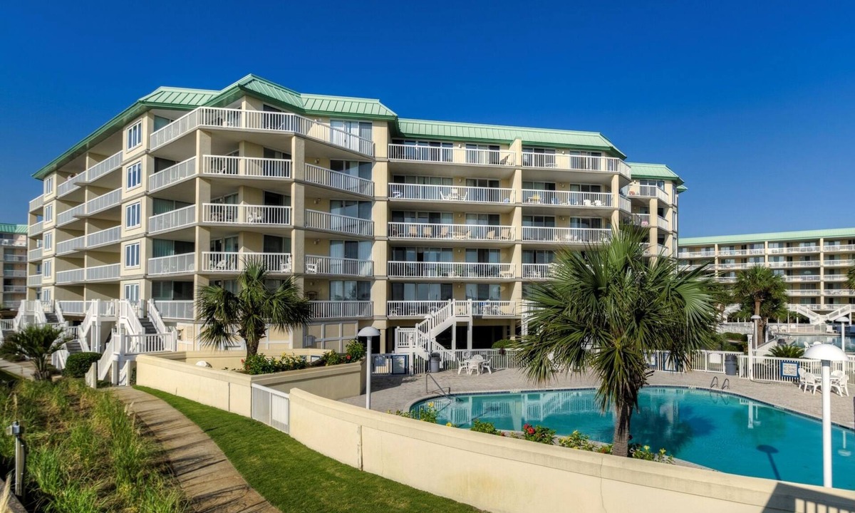 Litchfield by the Sea Condo | Oceanfront condo with private stairs from balcony and pool access in Litchfield By the Sea.