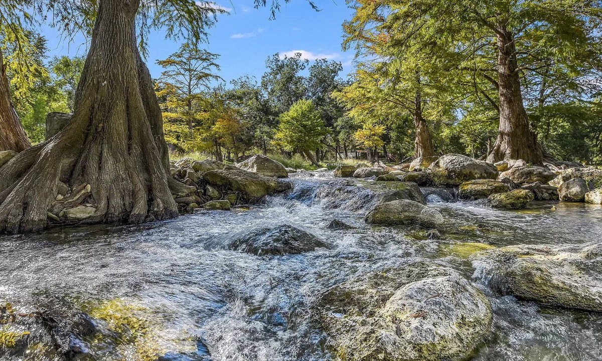 Gruene Condo | Premier river-front Penthouse Condo on the Guadalupe Rapids in Gruene!