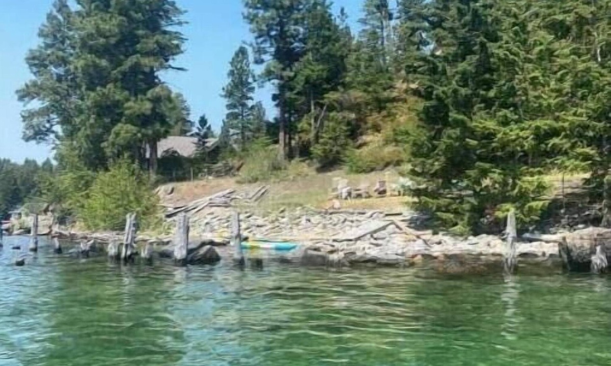 Woods Bay House | RARE FIND: Over 200' of Flathead Lake Lakefront with distinctive home