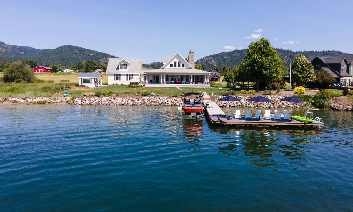 Laclede House | Riverfront custom home with private dock, hot tub, firepit, game room, grill, AC