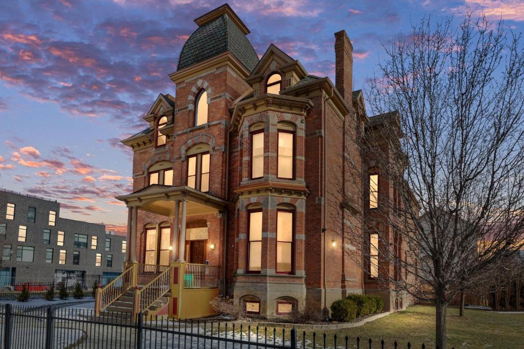 Midtown Apartment | The Lumber Baron's Mansion: 2 King Suites, 2.5BA + Gym