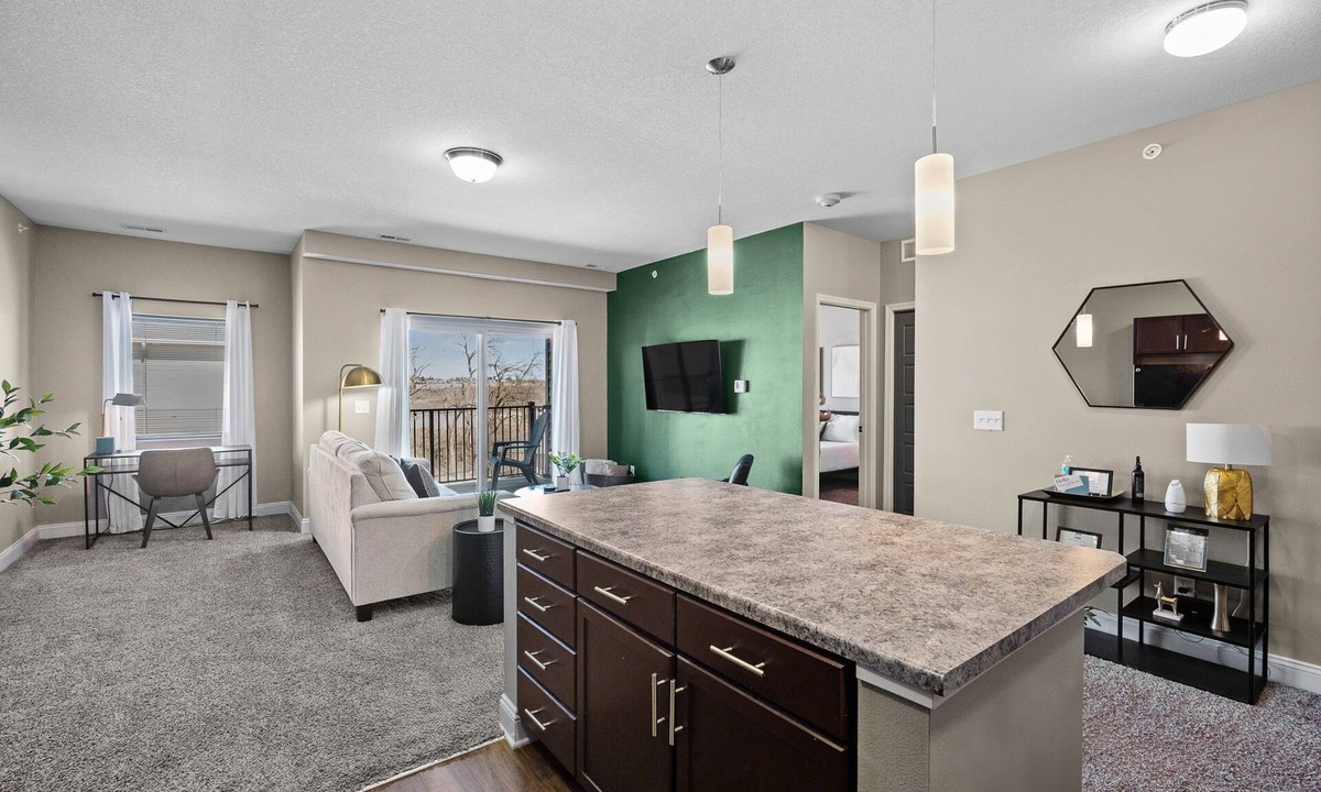West Des Moines Apartment | Top Floor! Garage Included + New Onsite Gym!