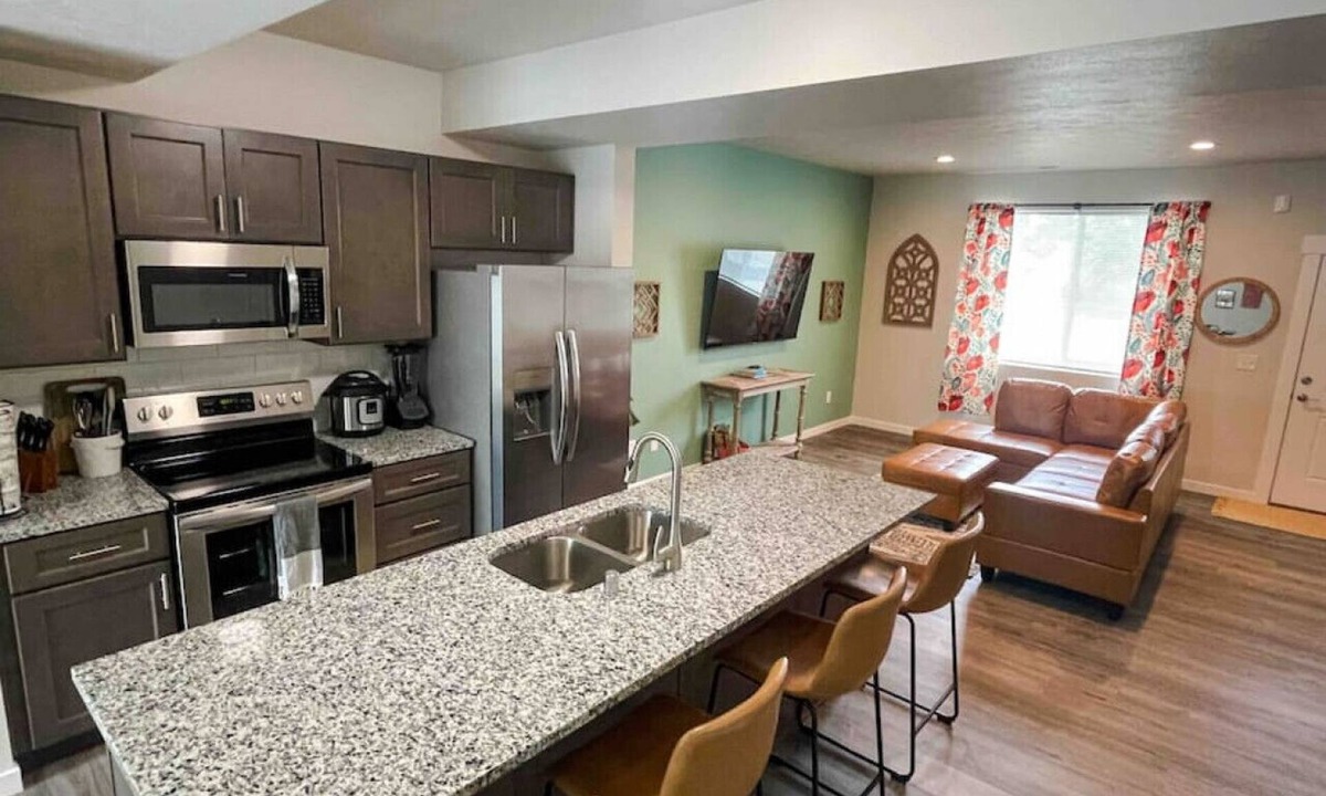 Spokane Apartment | UNIT B · Central 3/2, garage, private yard, walk to arena, EV charger