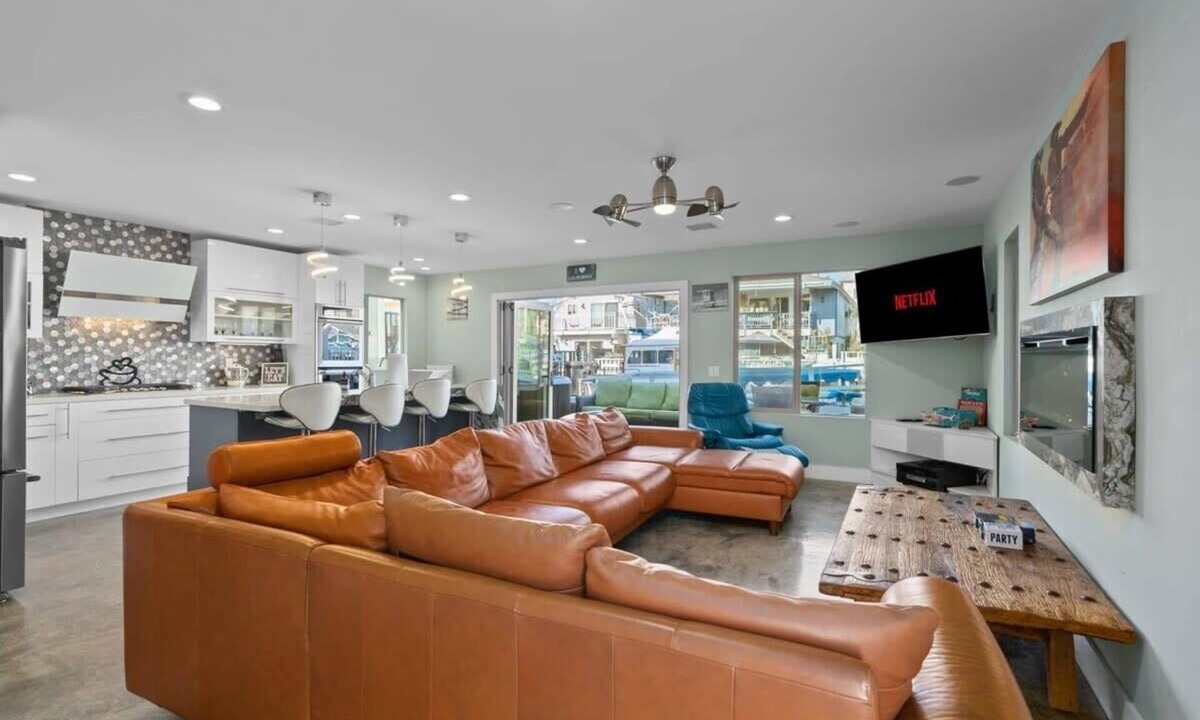 Sunset Beach House | Waterfront Luxury w/Hot Tub & Free Duffy Boat