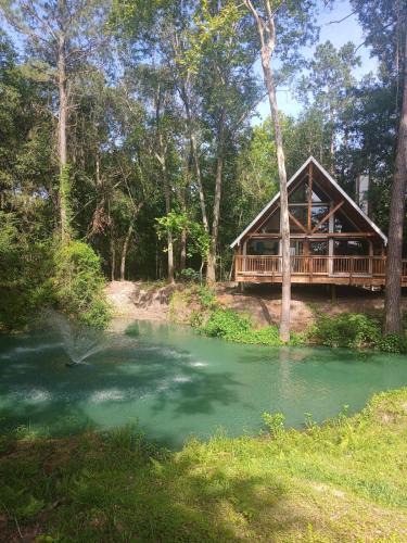 Plantersville House | Waterfront Texas Cabin in a Magical Forest Resort