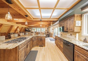 7,000 SQ FT CABIN ON 150 ACRES PRIVACY WITH ITS OWN PRIVATE LAKE.