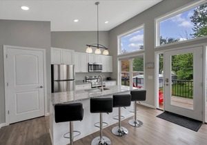 Brand New Condo w/ furnishings plus an open water view of Indian Lake