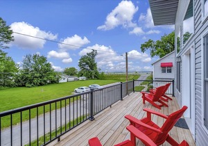 Brand New Condo w/ furnishings plus an open water view of Indian Lake