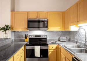 Contemporary 2BR 2BA Apartment by CozySuites