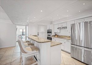 Luxury direct oceanfront corner penthouse with heated pool and garage parking