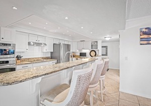Luxury direct oceanfront corner penthouse with heated pool and garage parking