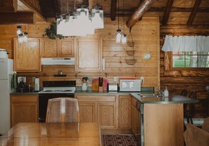 Seeley Cabin at Tamaracks Resort, a log lakefront cabin on Seeley Lake, Montana.