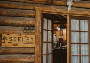 Seeley Cabin at Tamaracks Resort, a log lakefront cabin on Seeley Lake, Montana.
