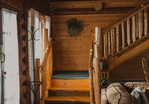 Seeley Cabin at Tamaracks Resort, a log lakefront cabin on Seeley Lake, Montana.