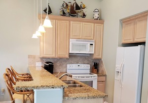 Tropical condo with POOL & close to the BEACH!