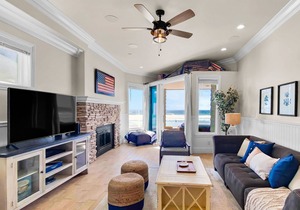 Upper level beachfront condo w/incredible views, gas fireplace, decks, & W/D
