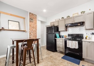 Walkable 1900s Townhome | Free Parking + Pets OK