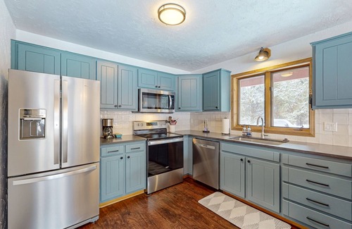 McCall Cabin | Beautiful home on quiet tree-lined property - gorgeous deck & expansive yard