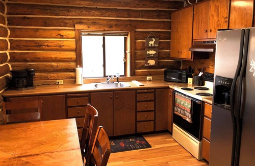 Coram Cabin | Black Bear CabinnA rustic cabin 10 minutes away from Glacier National Park!