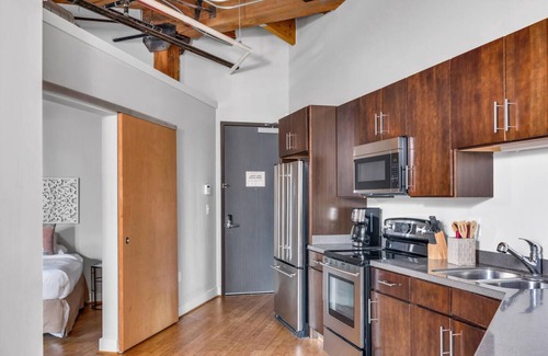 Downtown Nashville Condo | Enjoy extra savings | no rental car needed! Walk to Broadway! The June Loft by Music City Loft.