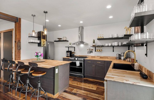 Kalispell House | Exclusive Guest Ranch with 13 bedrooms, Train Caboose and Hot Tub Lookout!
