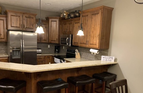 Spirit Lake Condo | Ground Floor Lakefront Unit with Stunning Views of East Lake