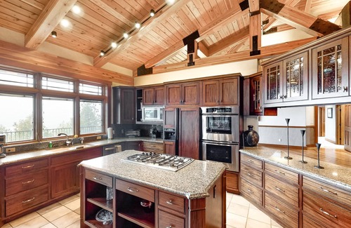 Kalispell House | Lake- & mountain-view home with decks, fireplaces, shuffleboard