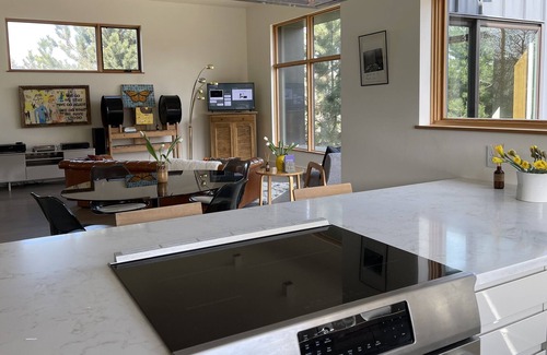 Riverfront Apartment | Modern, bright and spacious apartment with mountain views.