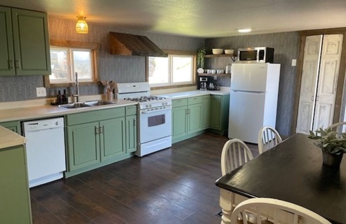Philipsburg House | Recently remodeled family home with large fenced in back yard, Full size kitchen, 2 full bathrooms, Bedroom 1 has a king size bed, Bedroom 2 has a queen size bed. The flex space has a trundle bed with 2 twins.