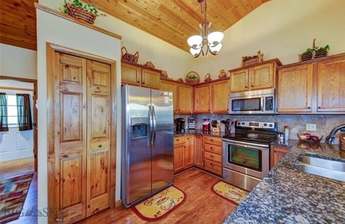 Big Sky Condo | Relax in beautiful Big Sky located just minutes from skiing and Town Square!