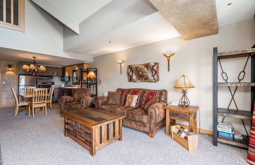 Big Sky Condo | Slope side family fun condo with shared pool and hot tub