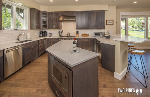 Big Sky House | Stunning and Spacious Mid-Century Town Center Home! Private Patio with Hot Tub!