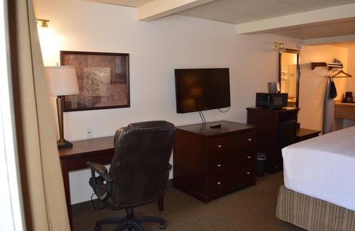 Columbia Falls Hotel | 25- ONE KING BED hotel with WiFi, AC in fabulous Columbia Falls. 20 mi to GNP