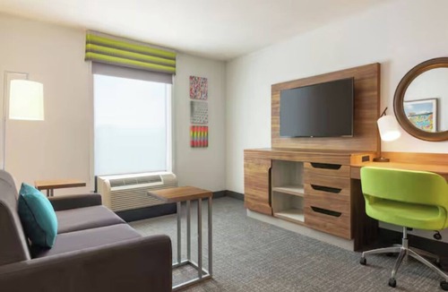 Houston Hotel | 3 Sleek Rooms in Houston | Free Parking + Indoor Pool | AMC Spring 10 - 3.1 mi
