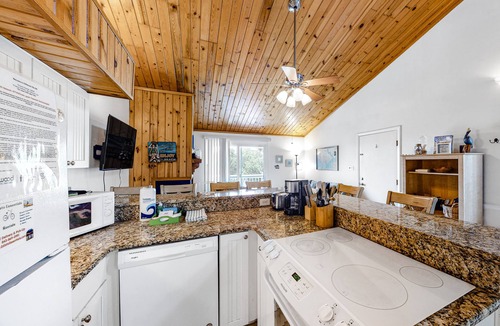 Ocean Ridge House | 3rd-floor, dog-friendly condo with loft, balcony, free WiFi and golf course view