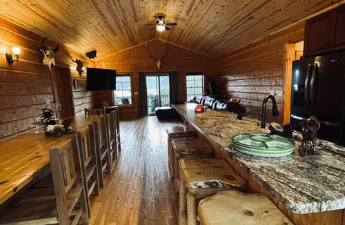 Wolf Creek Cabin | 4 bed 3 bath cabin at Holter Lake by Wolf Creek Craig. Fishing, pool table, fun!