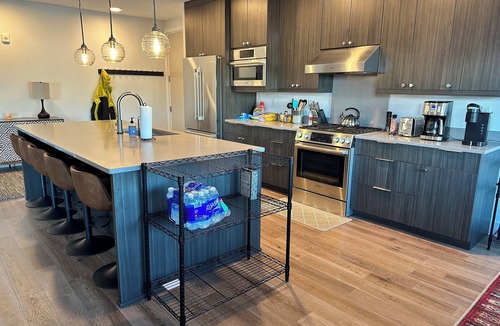 Powder Ridge Condo | 4 bedroom 3 bath with hot tub right on the mountain at Big Sky