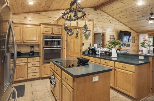 Lake Houston Cabin | 5 miles from Lake Houston! Cabin with pool, fire pit, and more