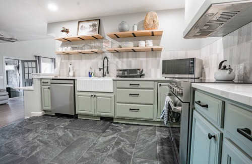 Warr Acres House | 5BR Warr Acres home — hot tub, game room, pool table. Full kitchen. Sleeps 14. #Lake