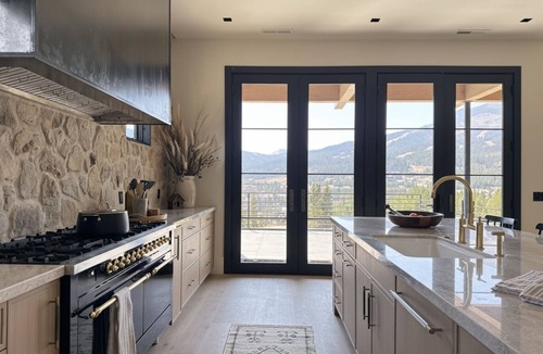 Big Sky Ski Chalet | 7-bedroom chalet with golf simulator, steam room, and hot tub
