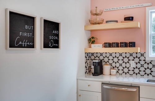 Downtown House | A cozy home and garden cottage situated across from million dollar homes.