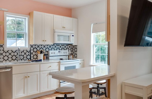 Downtown House | A cozy home and garden cottage situated across from million dollar homes.