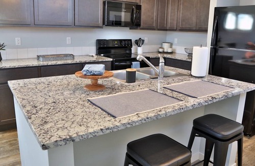 Boise Villa | A park-like setting in this BRAND NEW build near the river