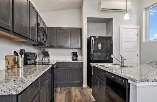 Boise Villa | A park-like setting between the BRAND NEW homes provides a way to relax and meet the neighbors.