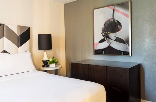 Norma Triangle Hotel | A Sophisticated Suite! Four Units with Furnished Living, Rooftop Pool, Balcony!